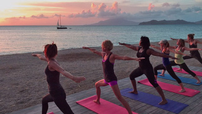 Yoga at Paradise Beach Nevis with St. Kitts view