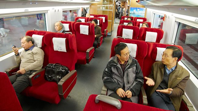 China express train interior passengers
