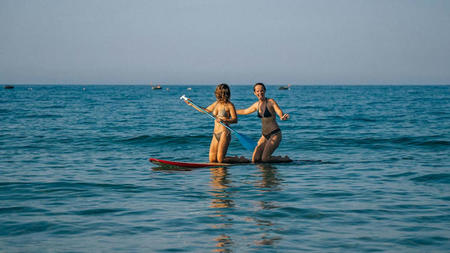 How Can Paddle Board Lessons Elevate Your Beach Experience? 
