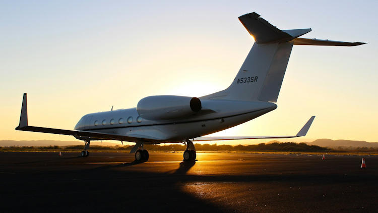 What should I consider before buying a private jet?