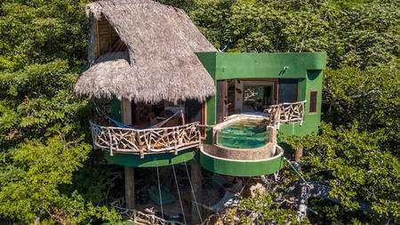 Celebrate Earth Month at these Luxury Treehouse Hotels Around the World