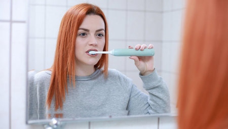 Are You Brushing Your Dental Implants the Wrong Way? Experts Explain What's At Stake