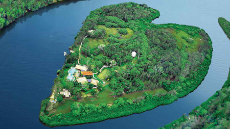 Escape to Richard Branson's Heart Shaped Private Island  