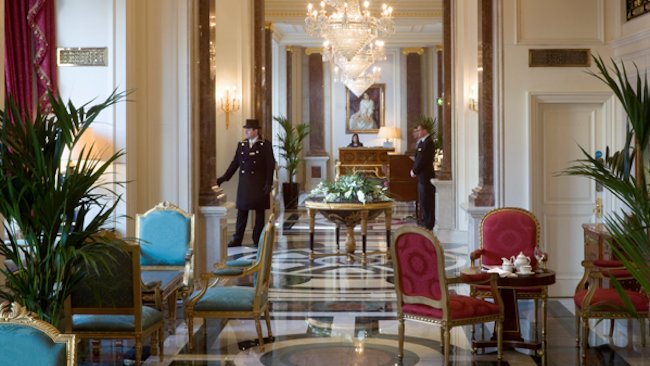 Bentley Hotel lobby doorman