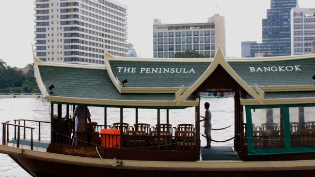 The Peninsula Bangkok boat on river