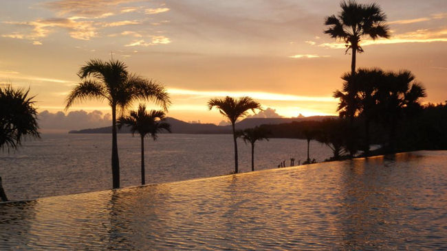 Shunyata Villas Bali infinity pool sunset