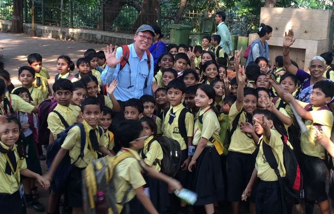 John Shors with kids in India