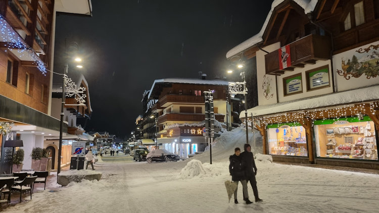 snowy street at night