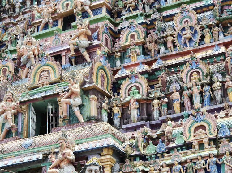 Colourfully-painted carvings